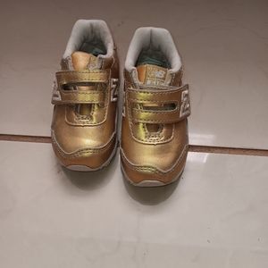 New balence 515 metallic gold toddler
